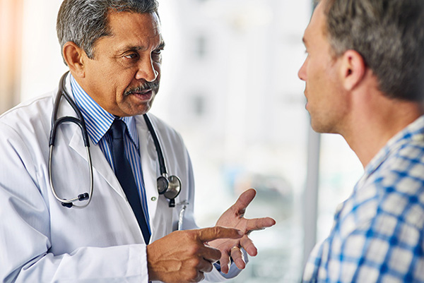 doctor giving results to patient